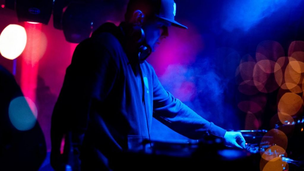 Dj at the night club, Dj playing music at the night club, night events